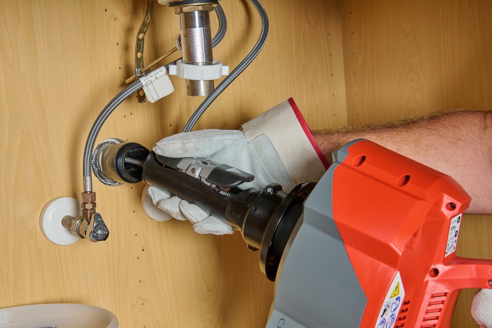 78048_R_K-46 Cordless SinkSnake Undersink C RGB_Action_72dpi